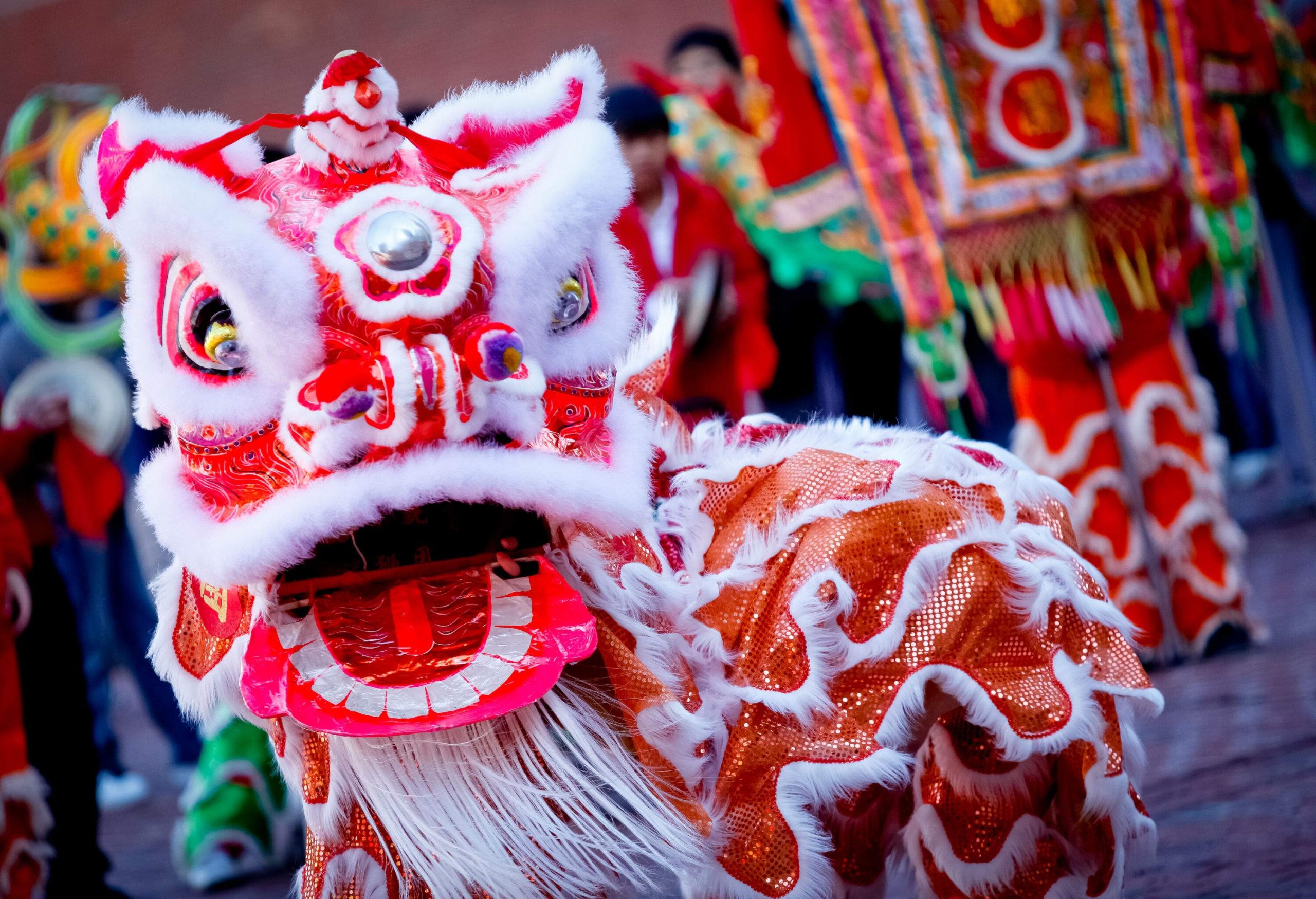 A traditional dragon dance performed in the square for the Chinese new year.