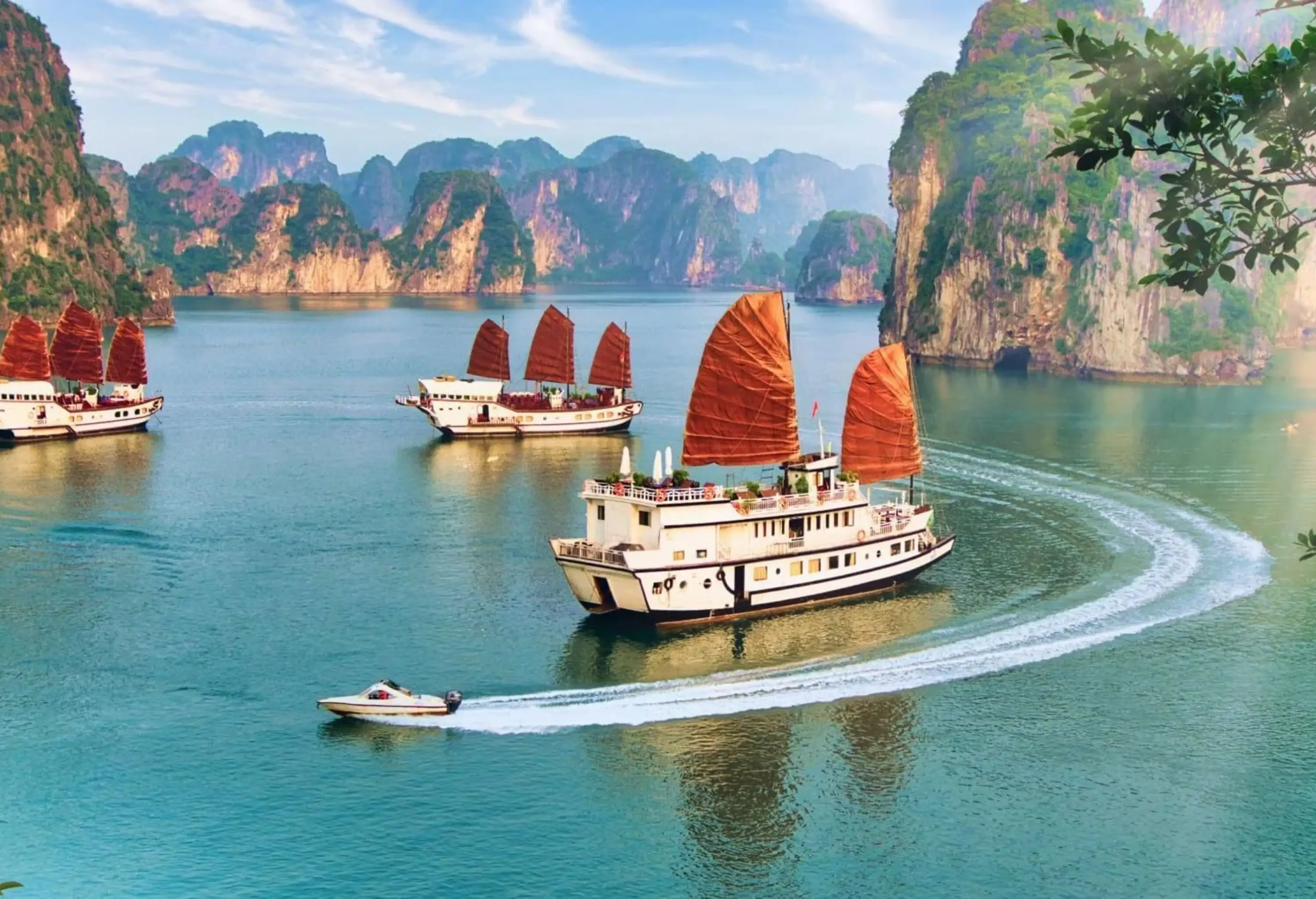 Aerial picturesque scenery with luxury cruises (sail boat) in Ha Long bay, Quang Ninh, Vietnam (HaLong) - stock photo