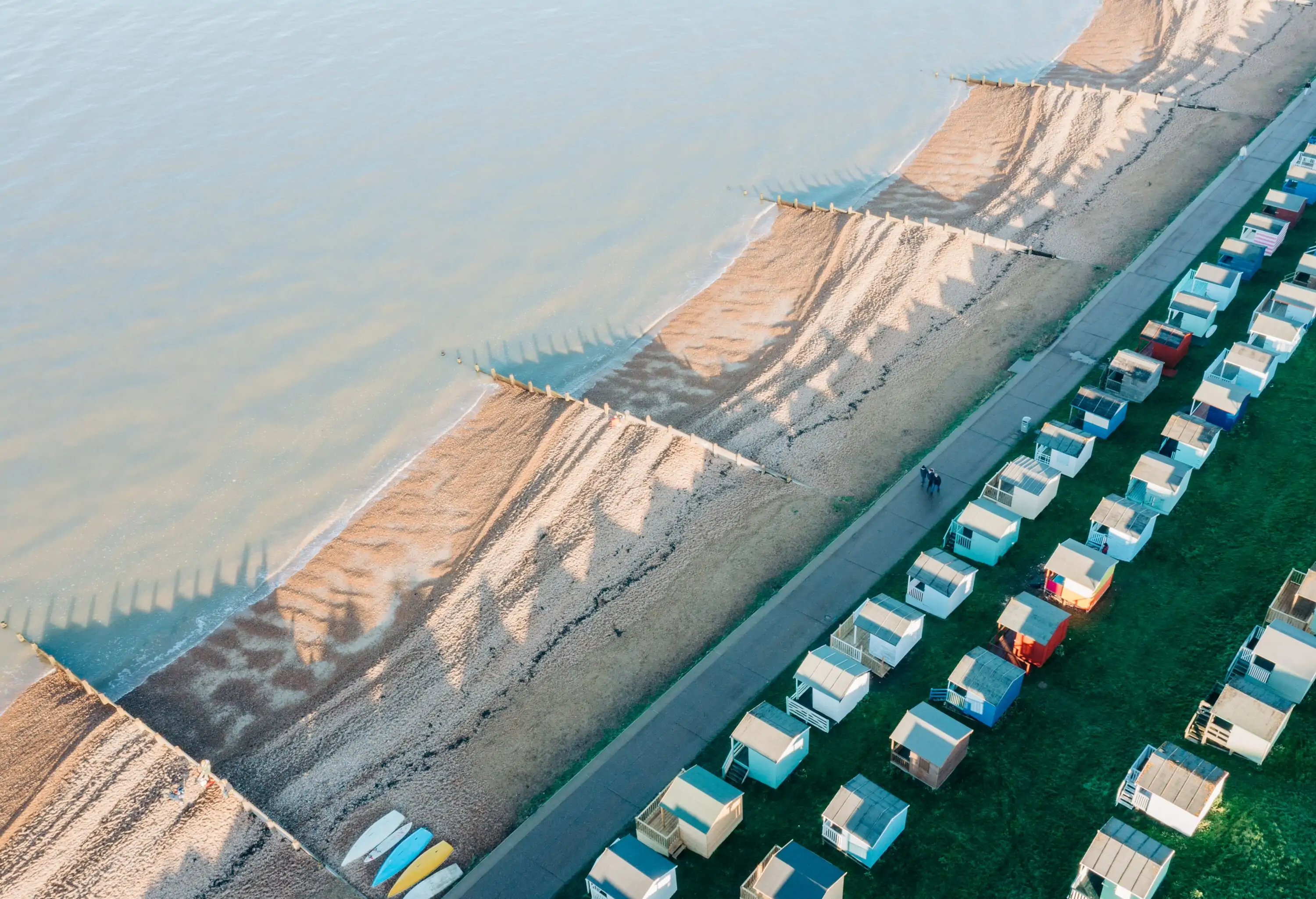 Drone view of Whitstable beach with pastel colours