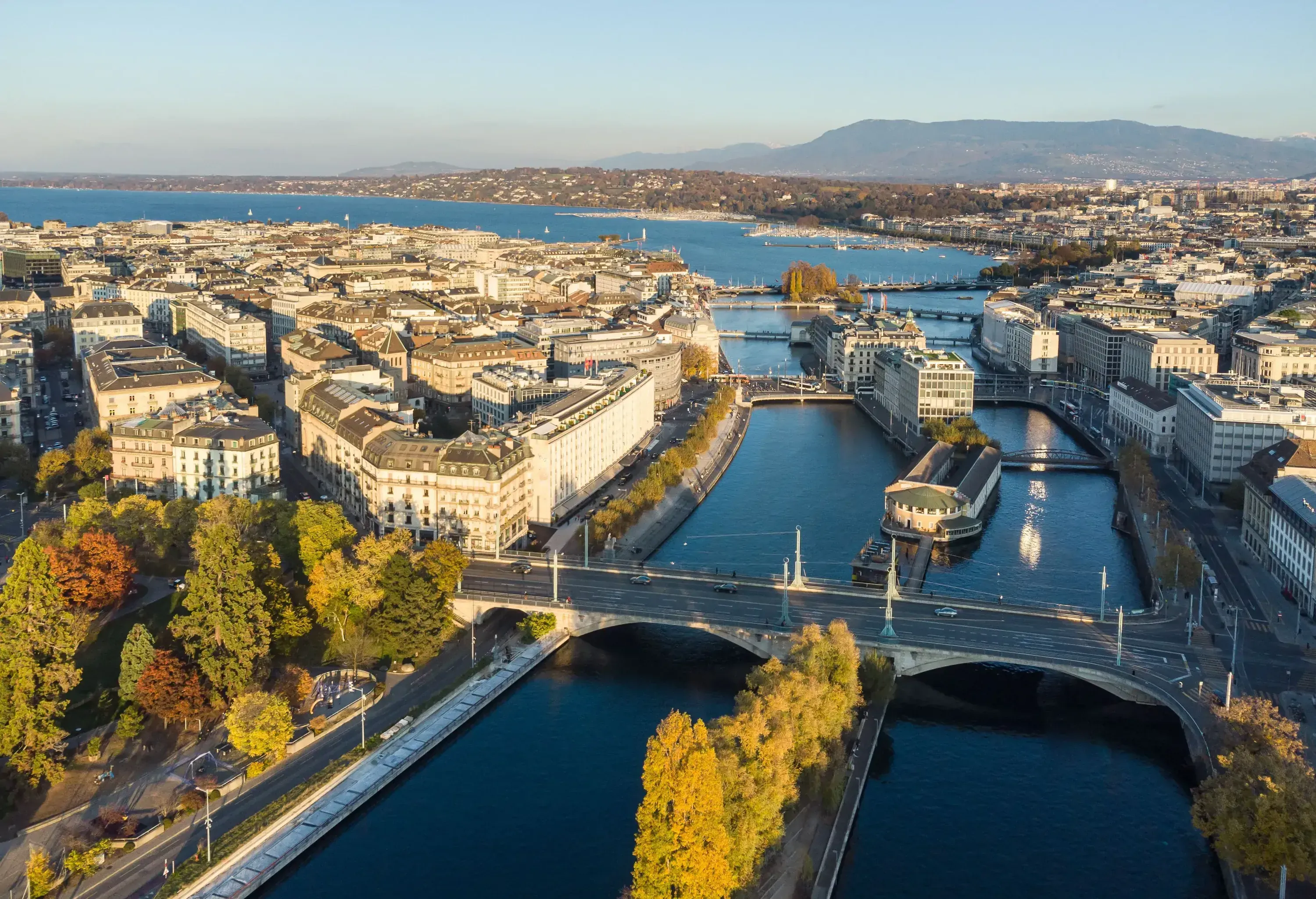 A lake running through the city crossed by multiple bridges.