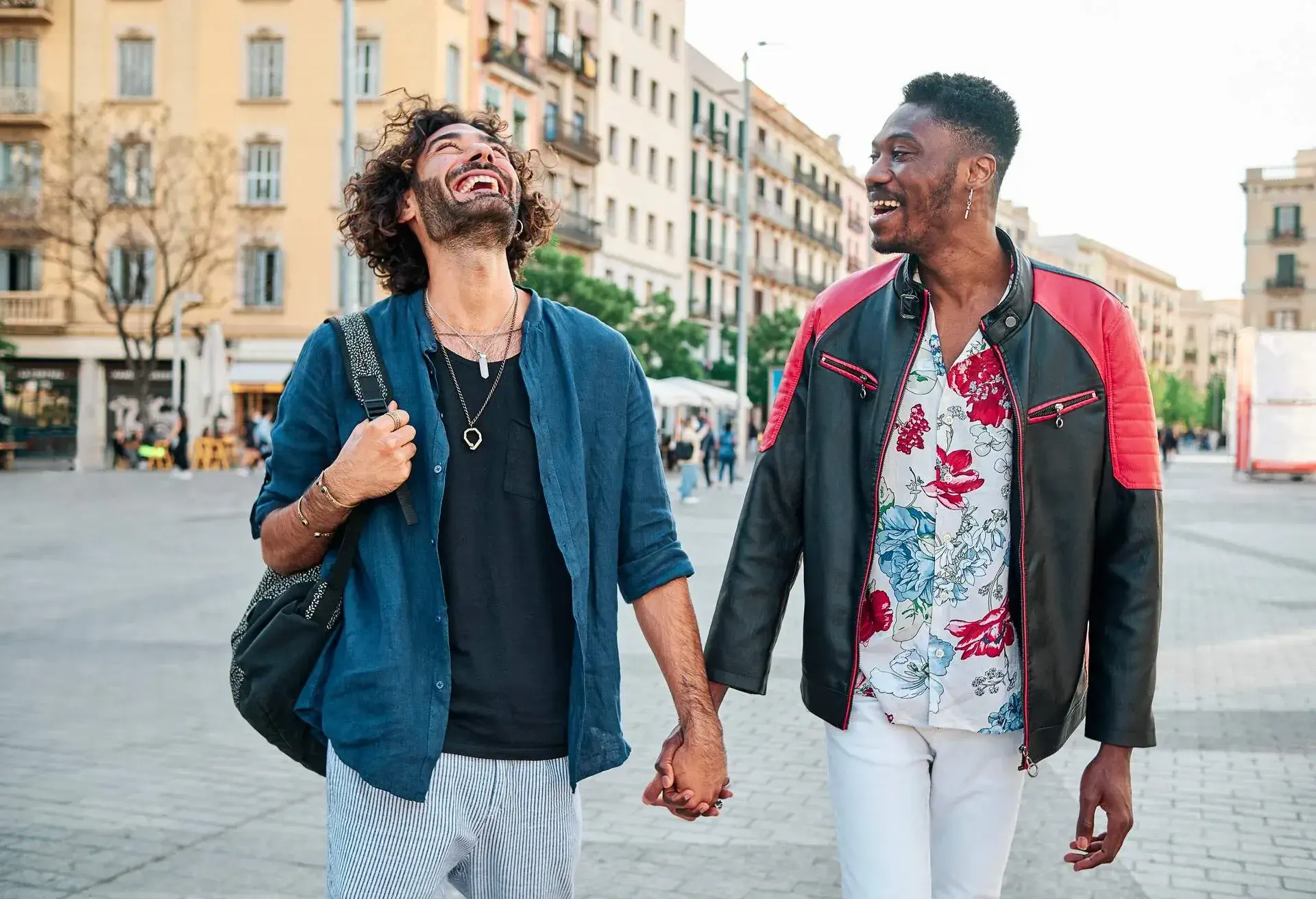 DEST_SPAIN_BARCELONA_PEOPLE_MEN_COUPLE_GAY_HOLDING_HANDS_GettyImages-1326126329
