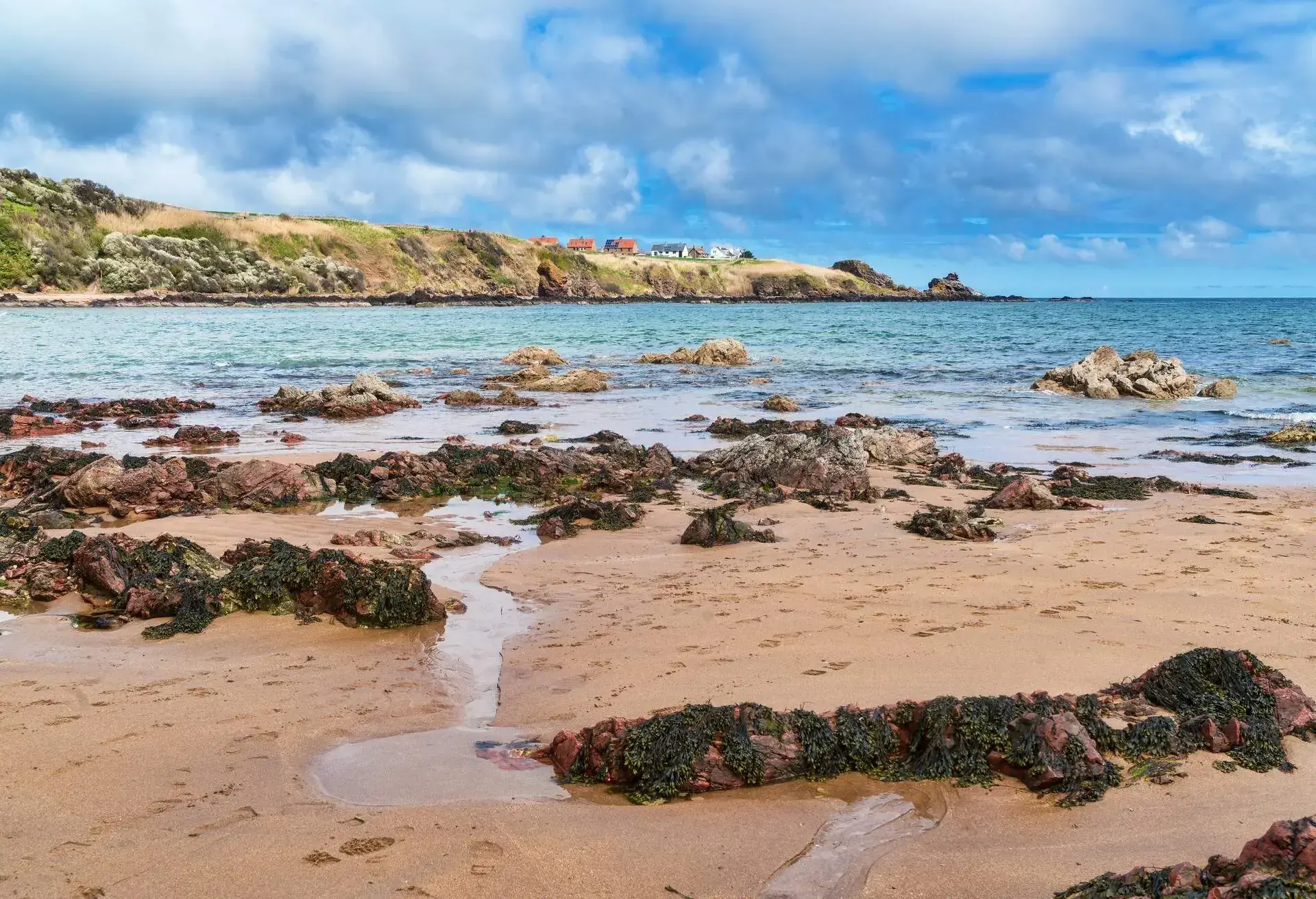 DEST_SCOTLAND_UK_COLDINGHAM-BAY-GettyImages-1074217464