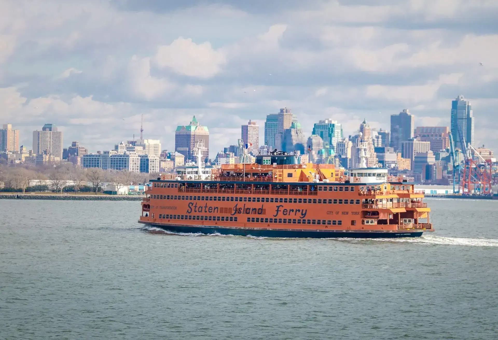 Staten Island Ferry and Lower Manhattan Skyline - New York, USA.; Shutterstock ID 587348906; Purchase Order: SF-06928905; Job: ; Client/Licensee: ; Other: