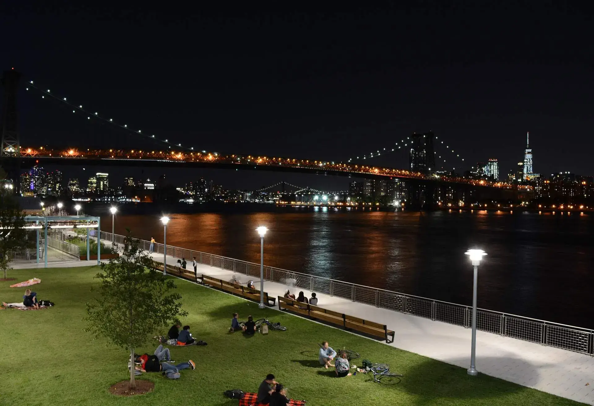 Domino Park In Williamsburg, Brooklyn at Night With Williamsburg Bridge and Manhattan Skyline In the Background; Shutterstock ID 1165659655
