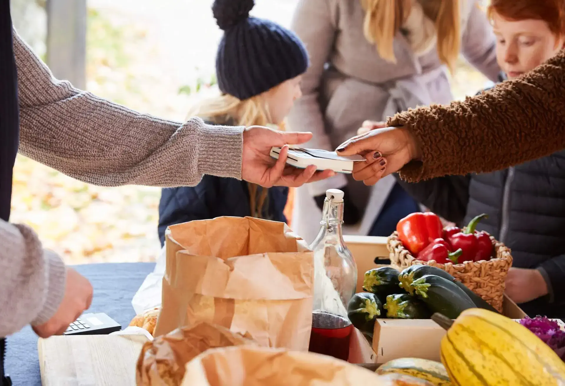 THEME_FOOD_MARKET_PEOPLE_PAYING_GettyImages-1214947659.jpg