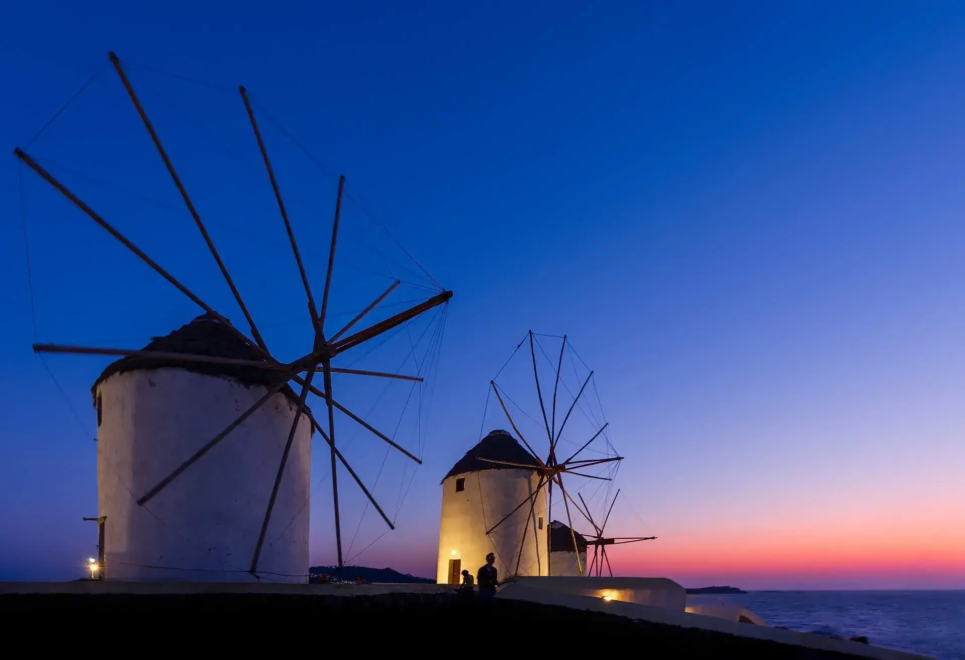 The old windmills of Mykonosa at dusk
