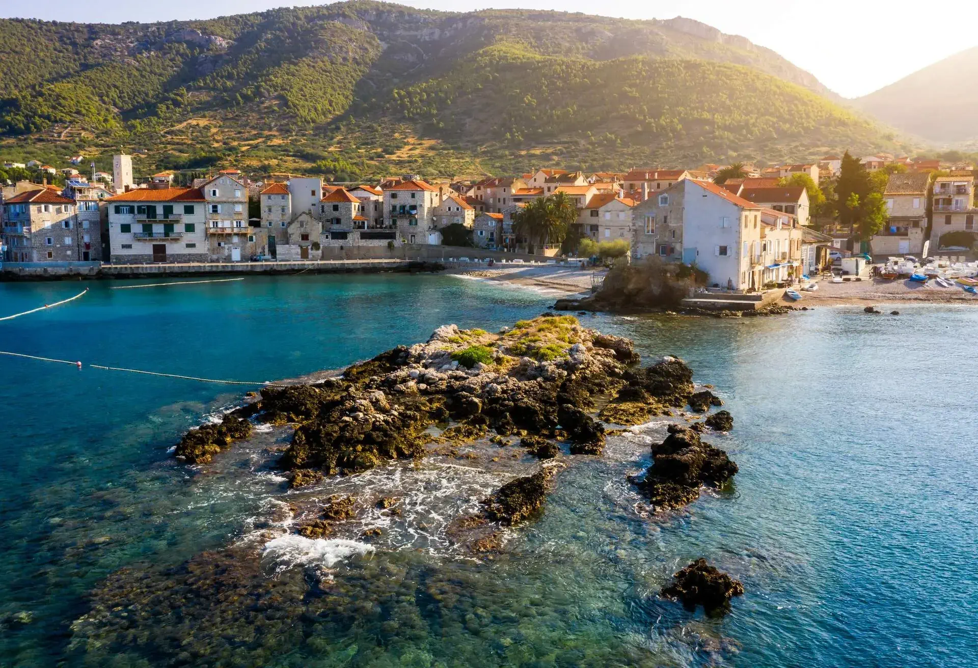 Waterfront scenic view at old fisherman place Komiza on Island Vis, Croatia.