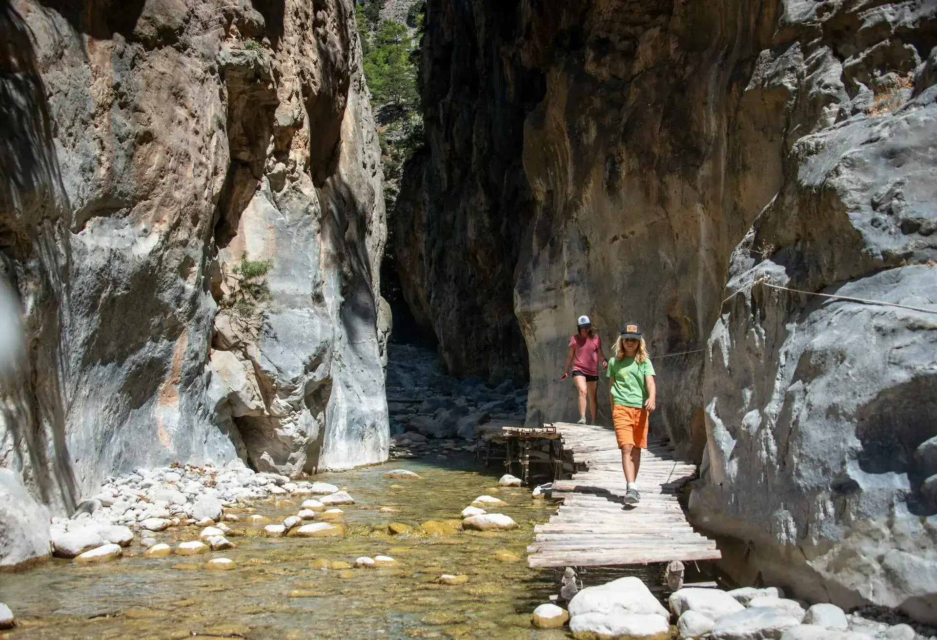 DEST_GREECE_CRETE_SAMARIA_GORGE_PEOPLE_GHIKERS_GettyImages-1277845072