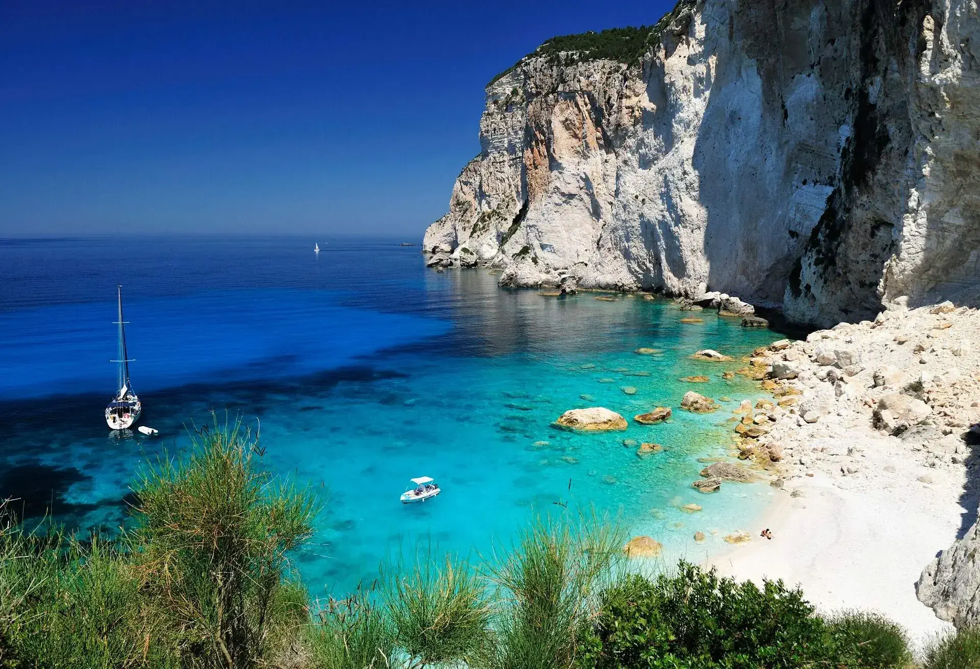 Boats in the bay of Erimitis on Greek island of Paxos.