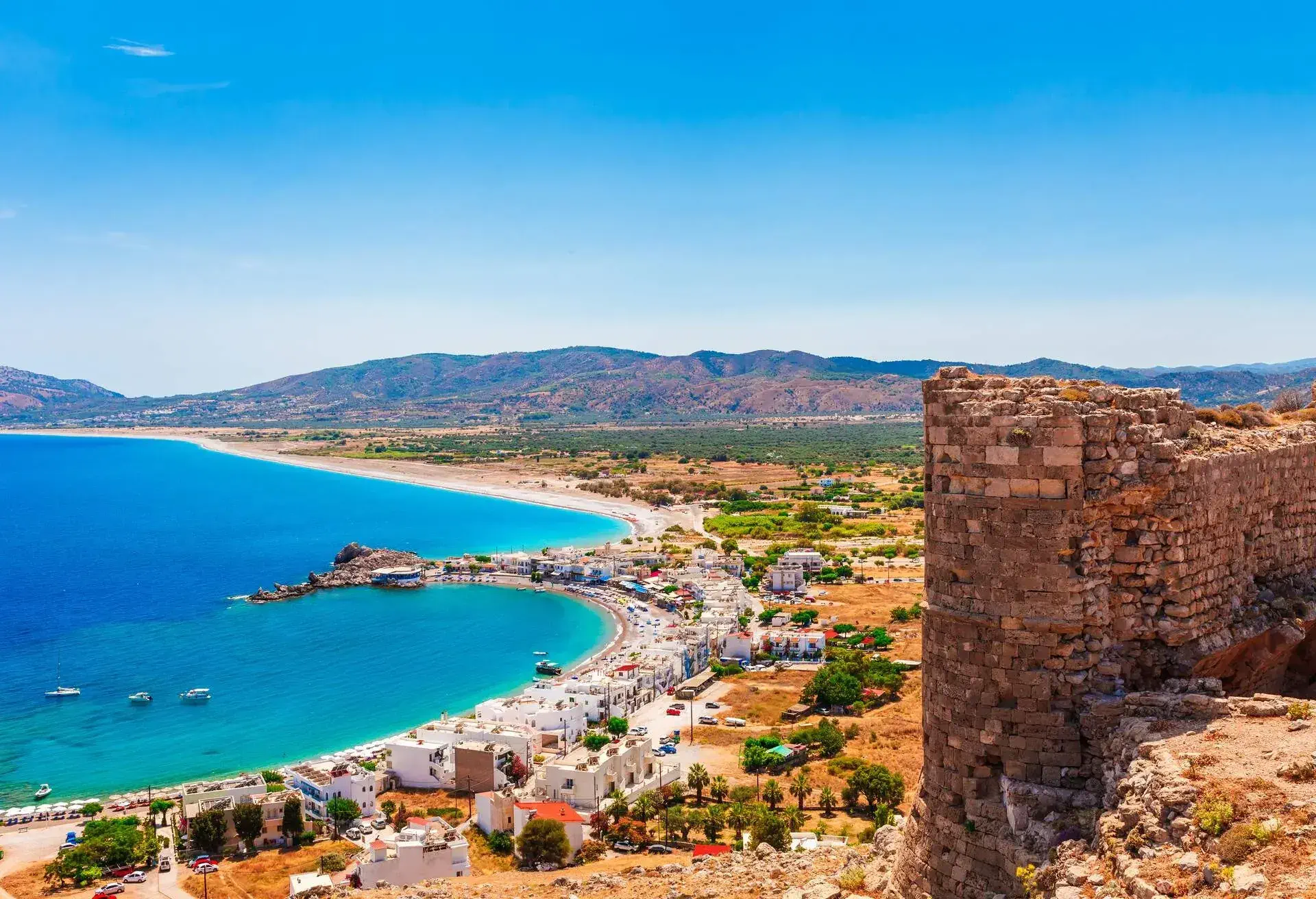 Sea skyview landscape photo from Feraklos castle near Agia Agathi beach on Rhodes island, Dodecanese, Greece. Panorama with sand beach and clear blue water. Famous tourist destination in South Europe