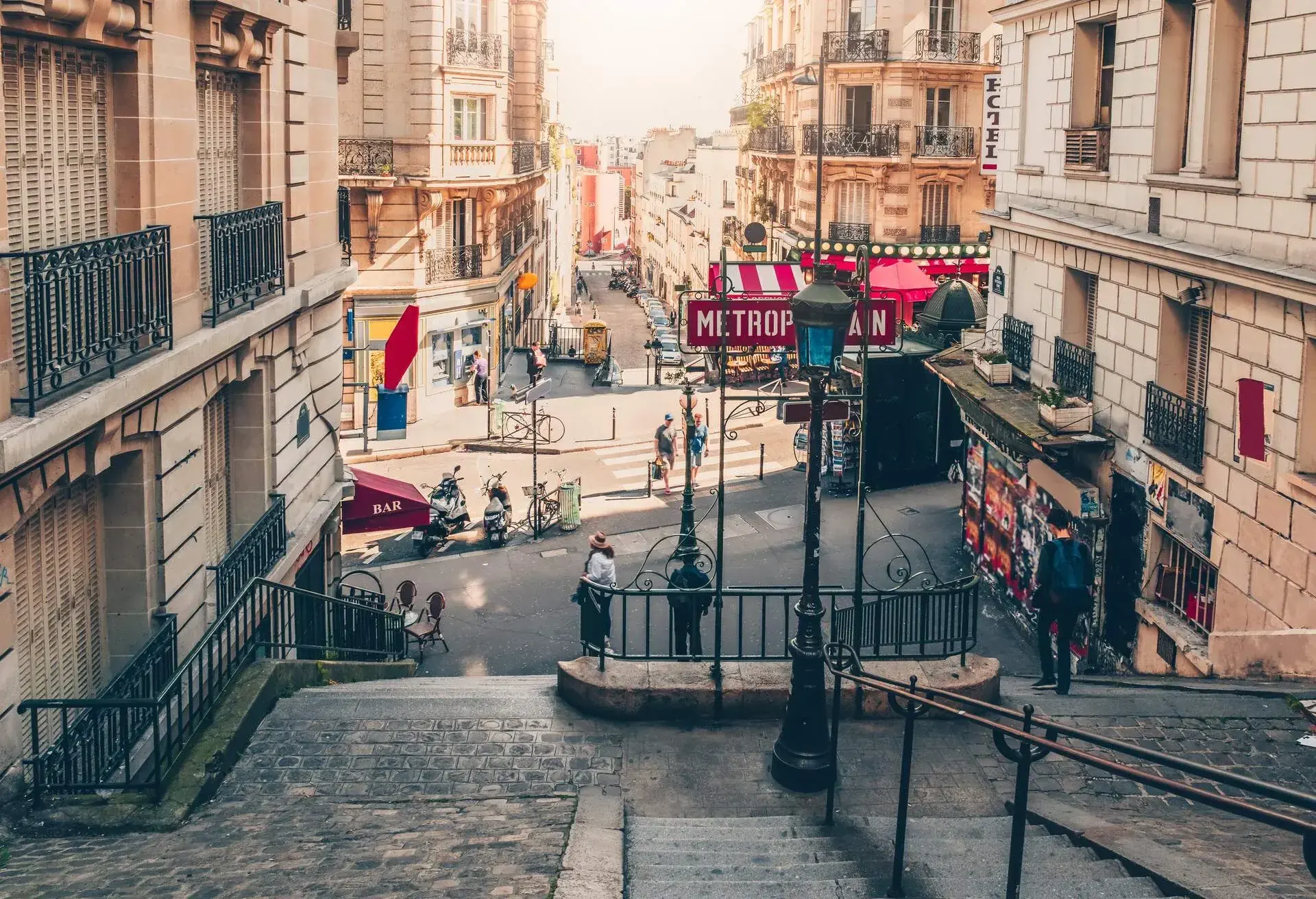 Typical Montmartre staircase and entrance to Paris Metro subway in Paris, France. Architecture and landmarks of Paris. Postcard of Paris; Shutterstock ID 1006001962; Purpose: Destiny; Brand (KAYAK, Momondo, Any): Any