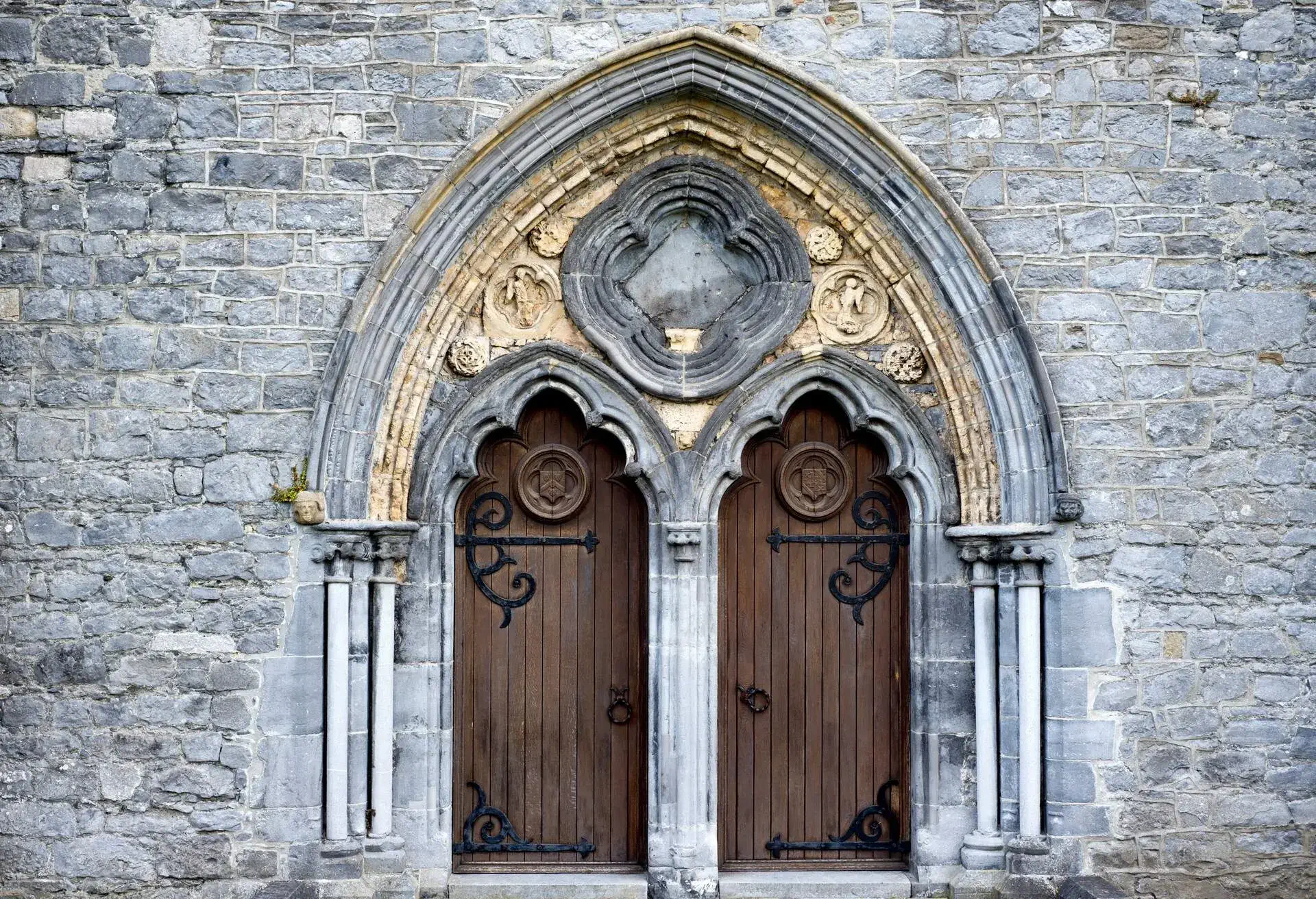 double arched wooden doors in to St Caniceâs Cathedral kilkenny ireland