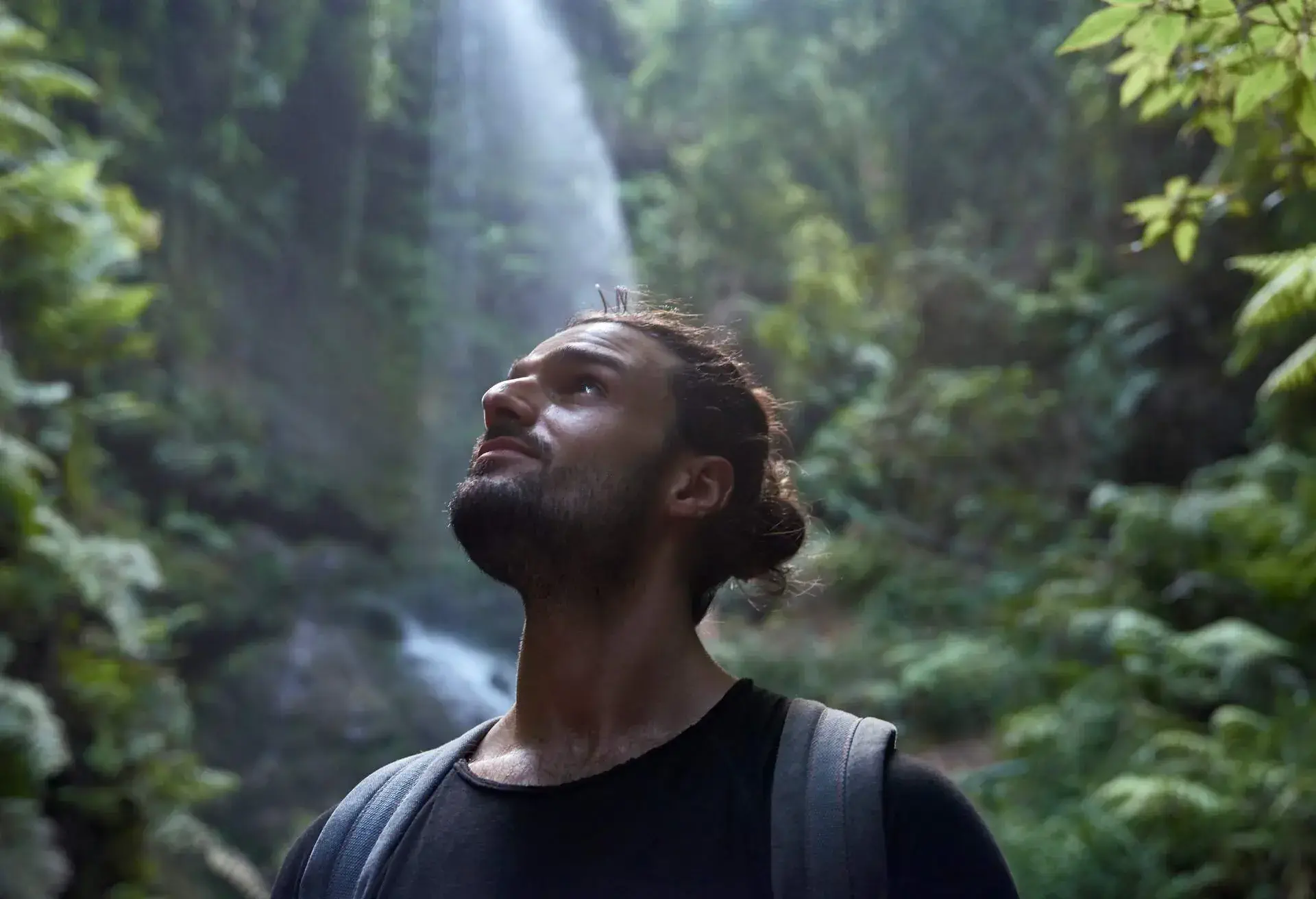 DEST_SPAIN_WATERFALL_THEME_PEOPLE_MAN_HIKE_GettyImages-1131368265