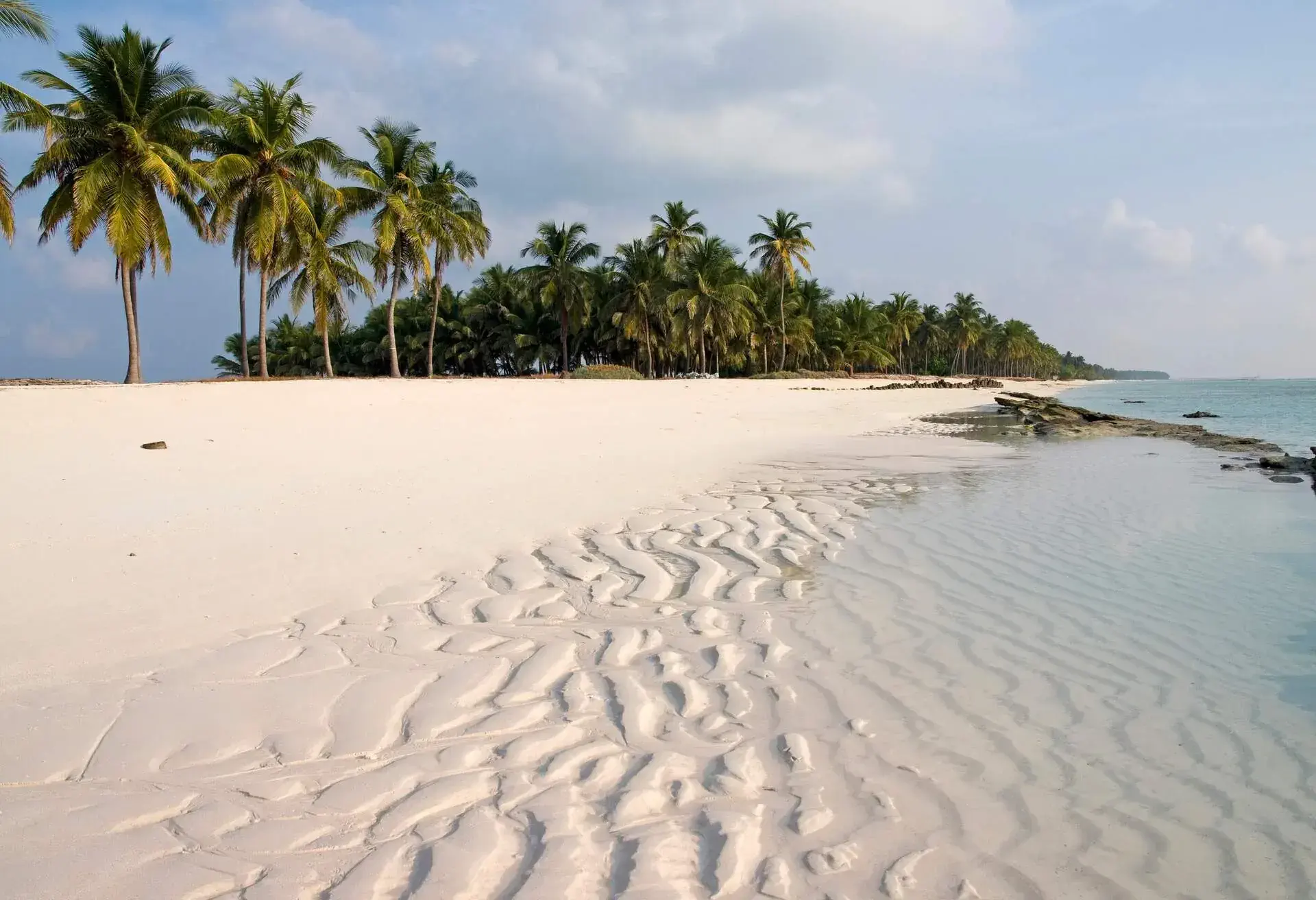 Early morning on beach, Lakshadweep Islands, India.