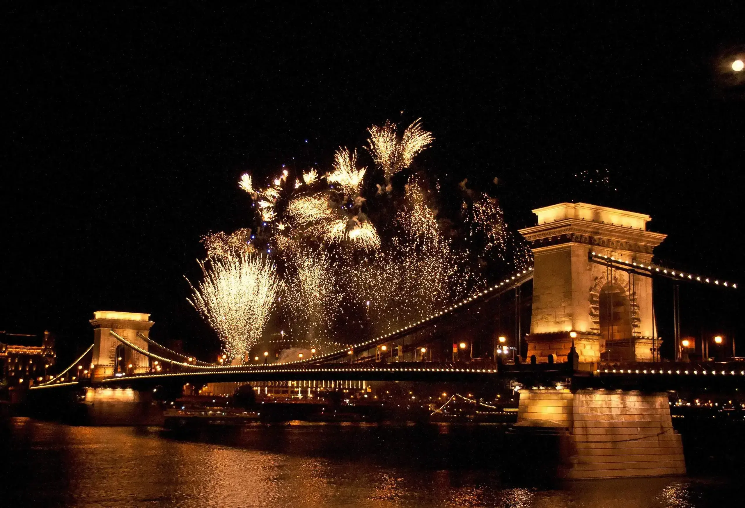 A beautiful display of fireworks over the iconic Széchenyi Chain Bridge in Budapest, Hungary, illuminated the night sky with bursts of colourful lights and created a breathtaking scene.