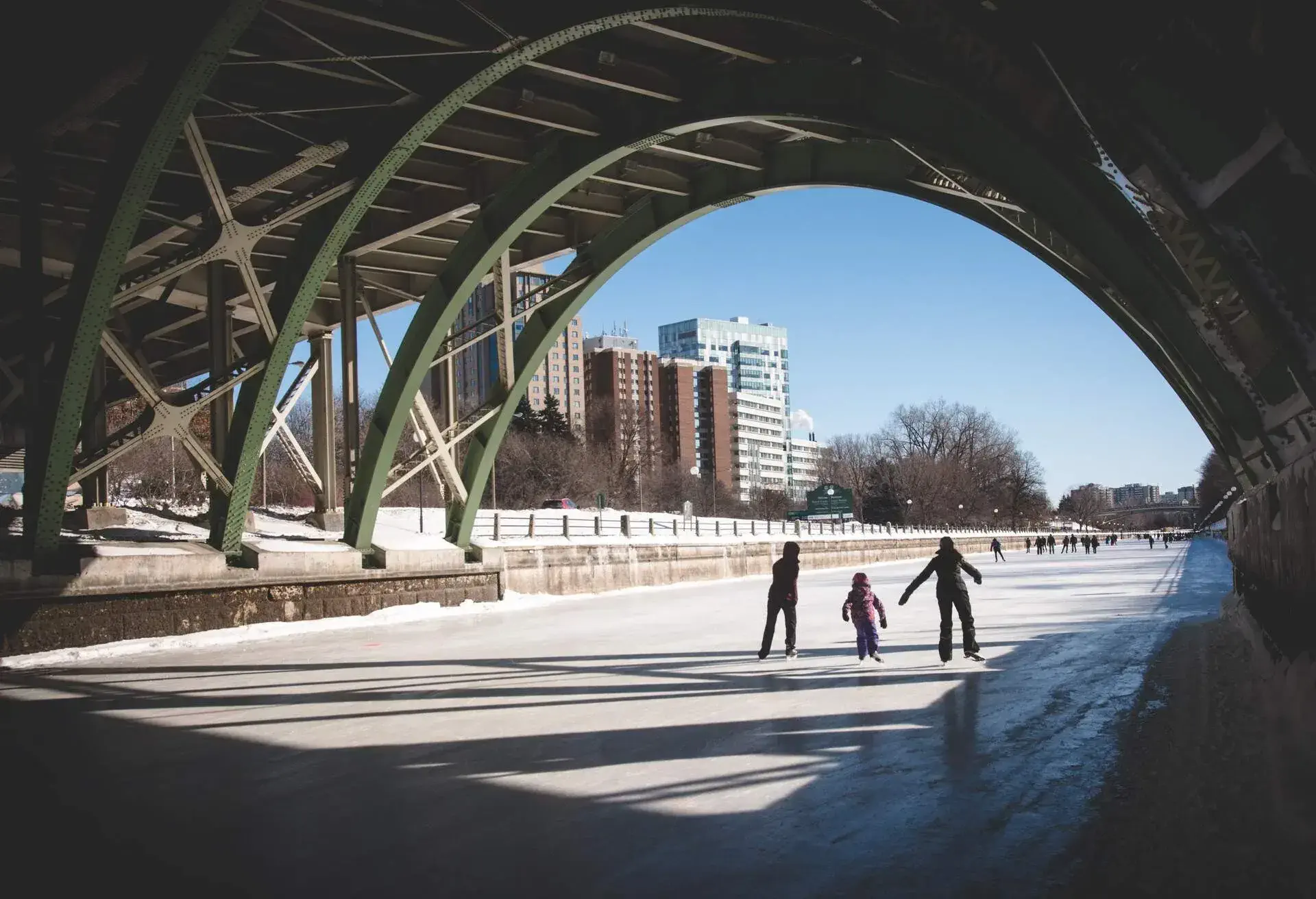 A family skating on the ice in Ottawa