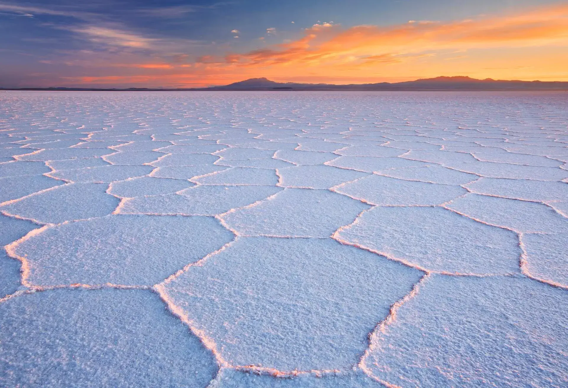 The world's largest salt flat, Salar de Uyuni in Bolivia, photographed at sunrise.
