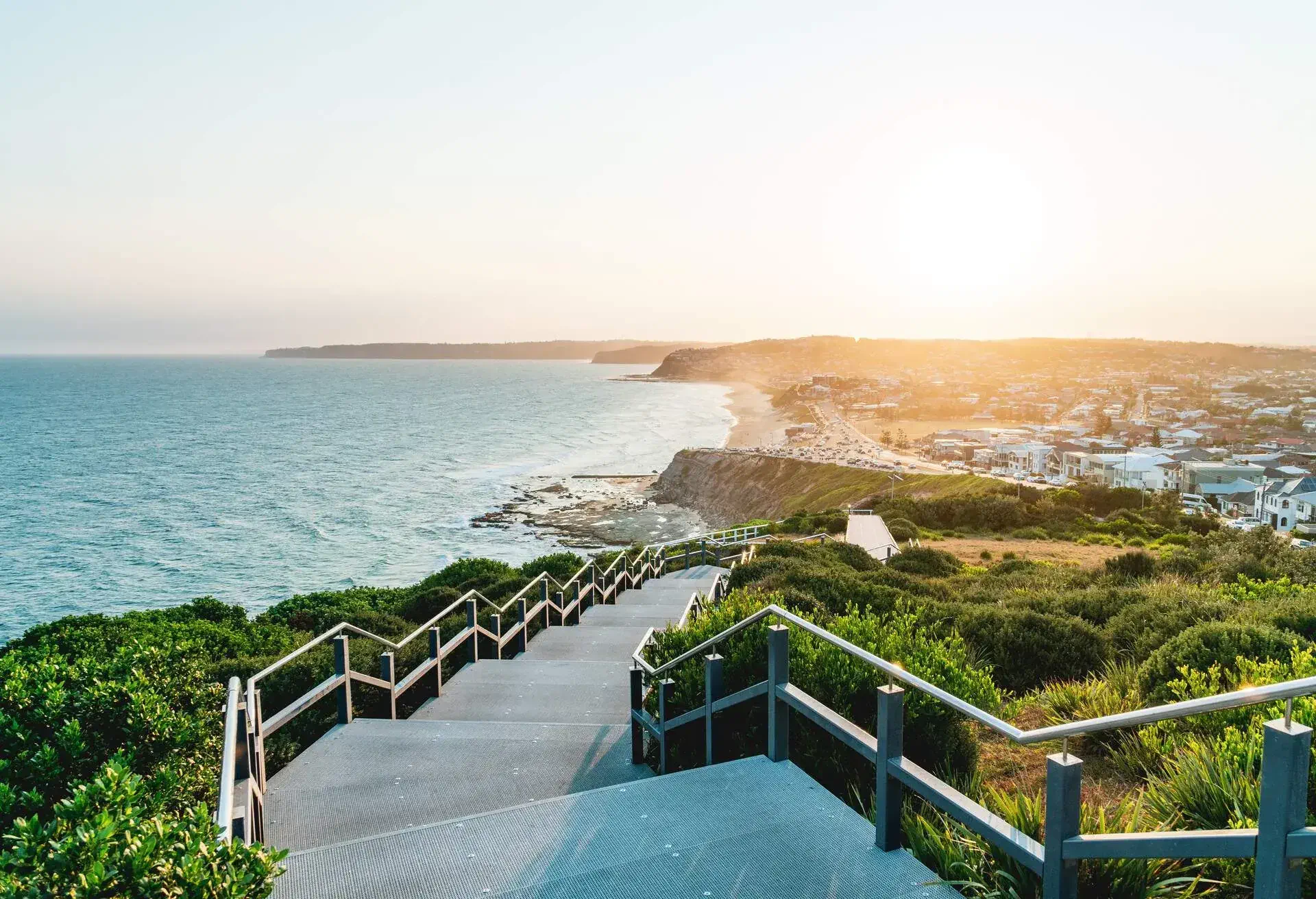 Anzac Memorial Walk and Bar Beach at sunset in Newcastle, NSW, Australia.