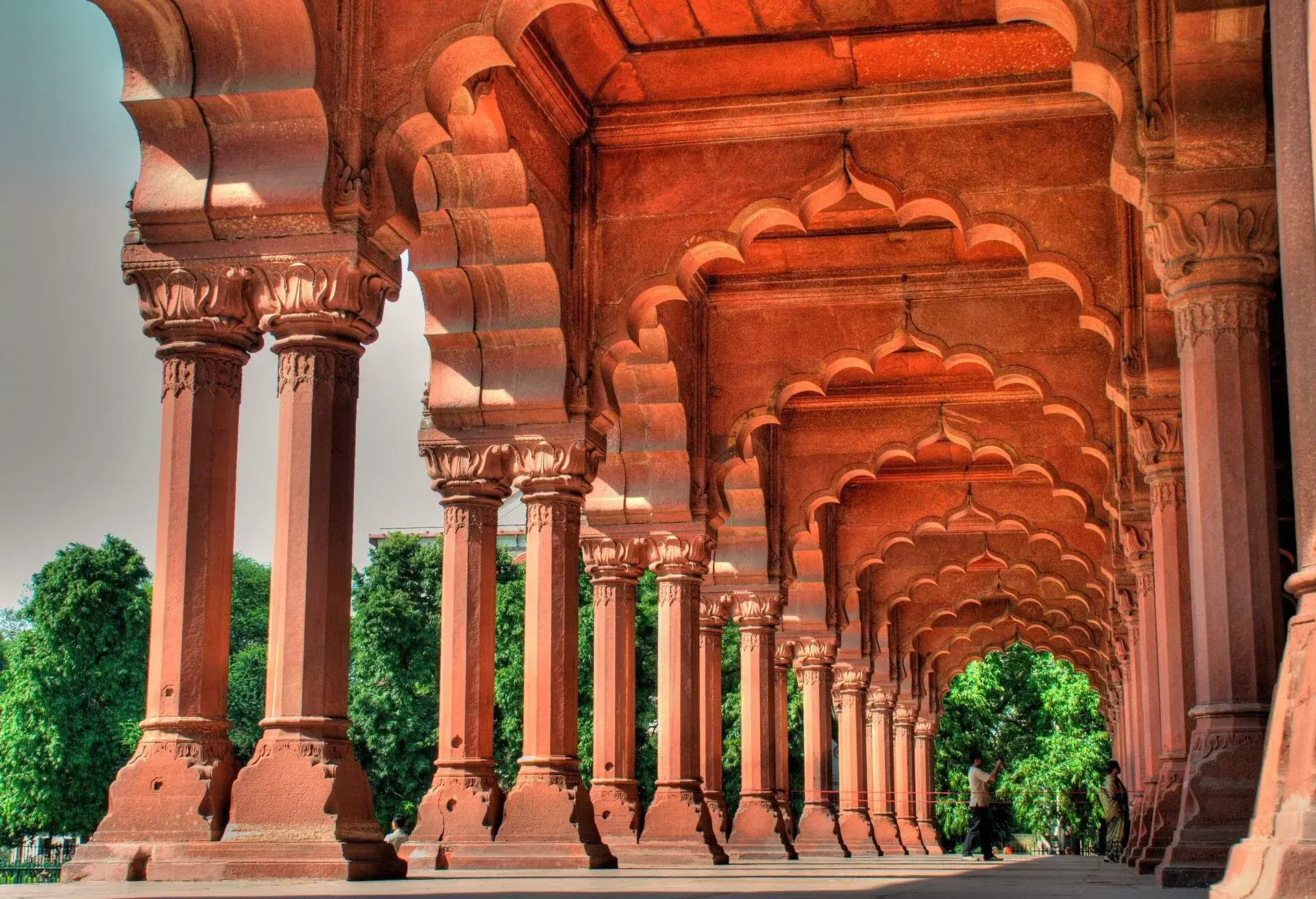 Diwan-i-Aam is popularly known as the Hall of Public Audience and is located within the premises of the Red Fort. The main purpose of this hall was to serve as a courtyard with a pavilion for audiences and an ornate throne-balcony for the emperor. It has heavy curtains with depth of around three bays. The columns inside the pavilion are painted in gold and there is also a railing made of gold and silver that separated the throne from the public.