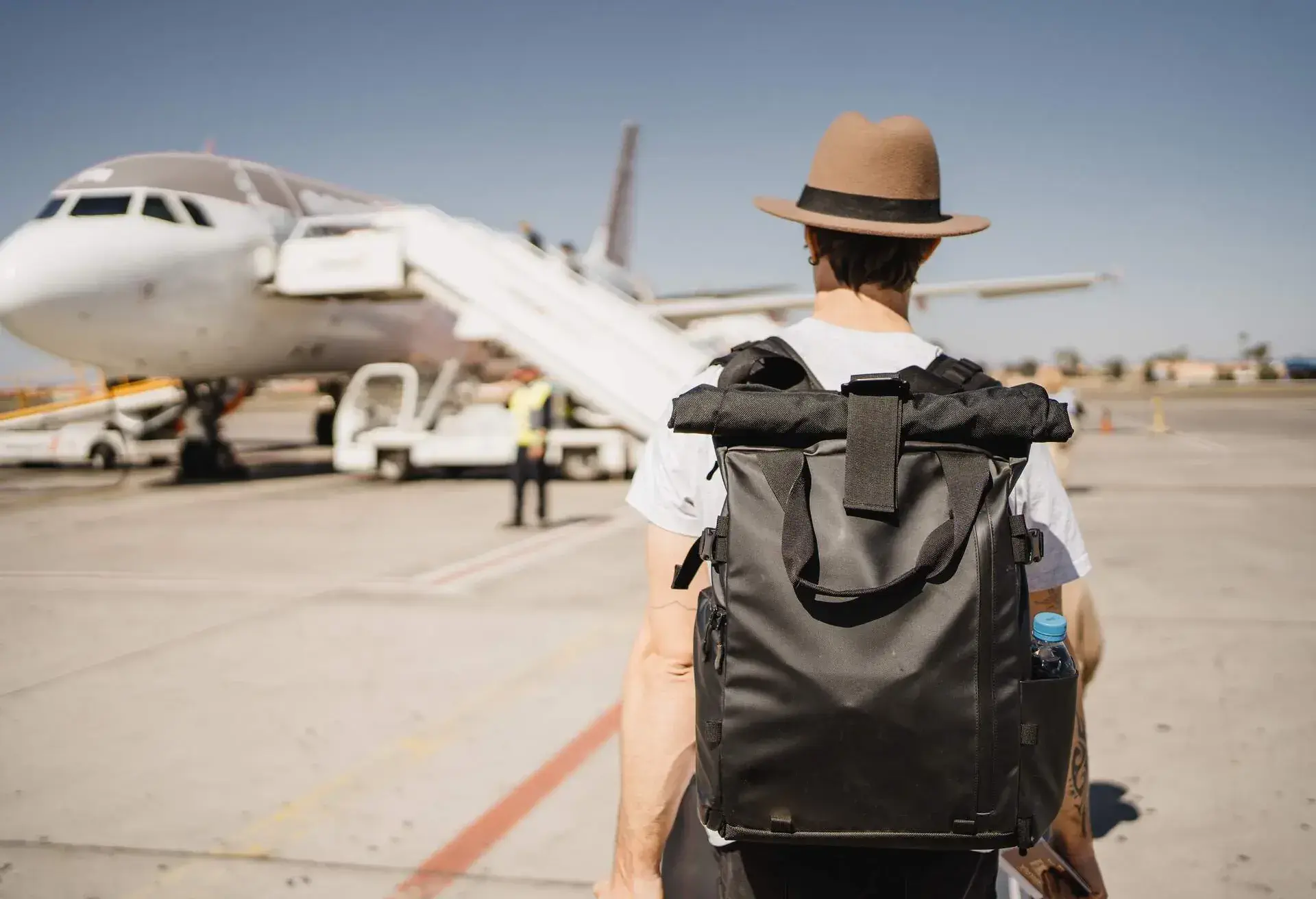 A person boarding a plane