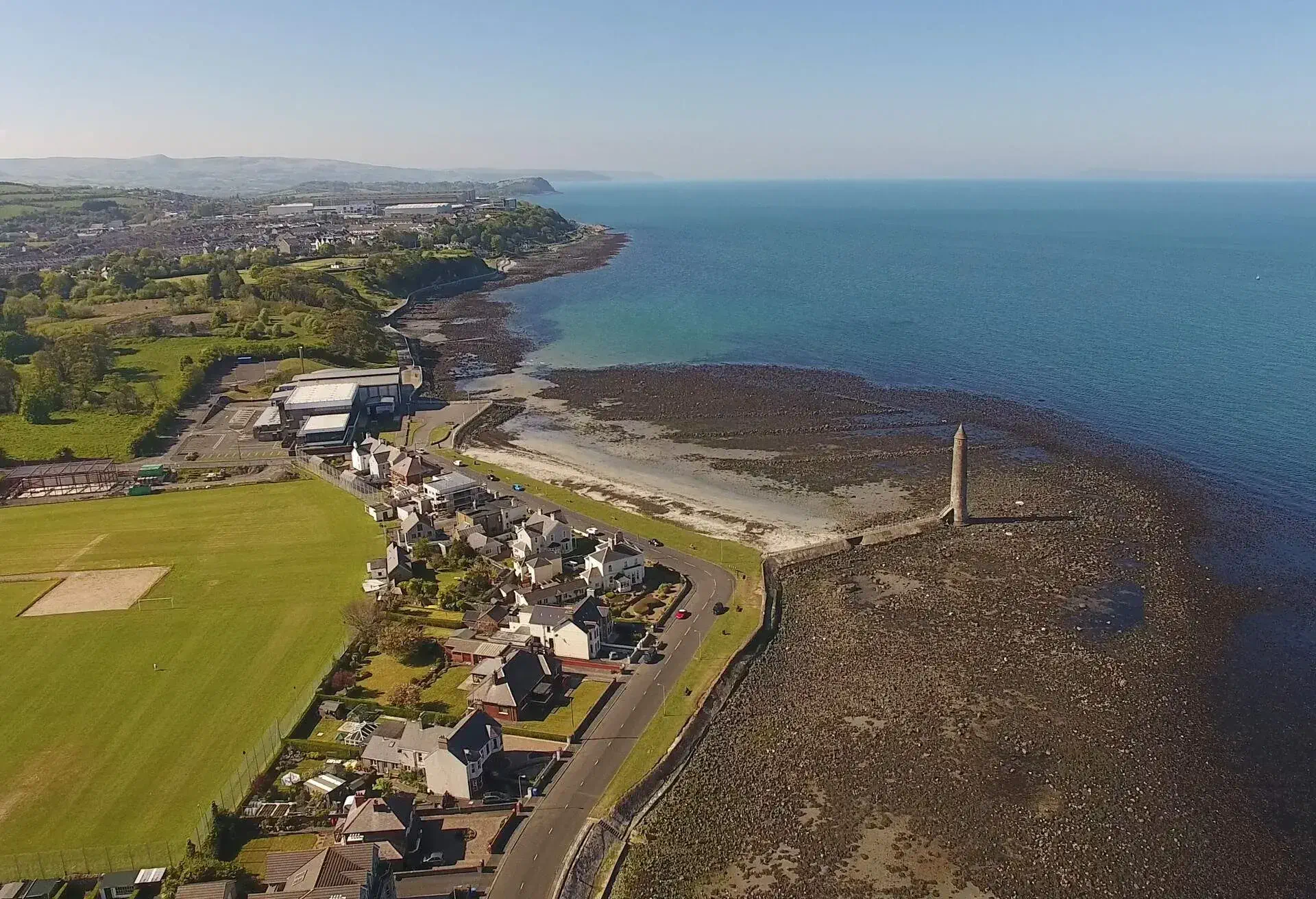 Aerial view of the Chaine Memorial Tower 'Giants Pencil' by the seaside