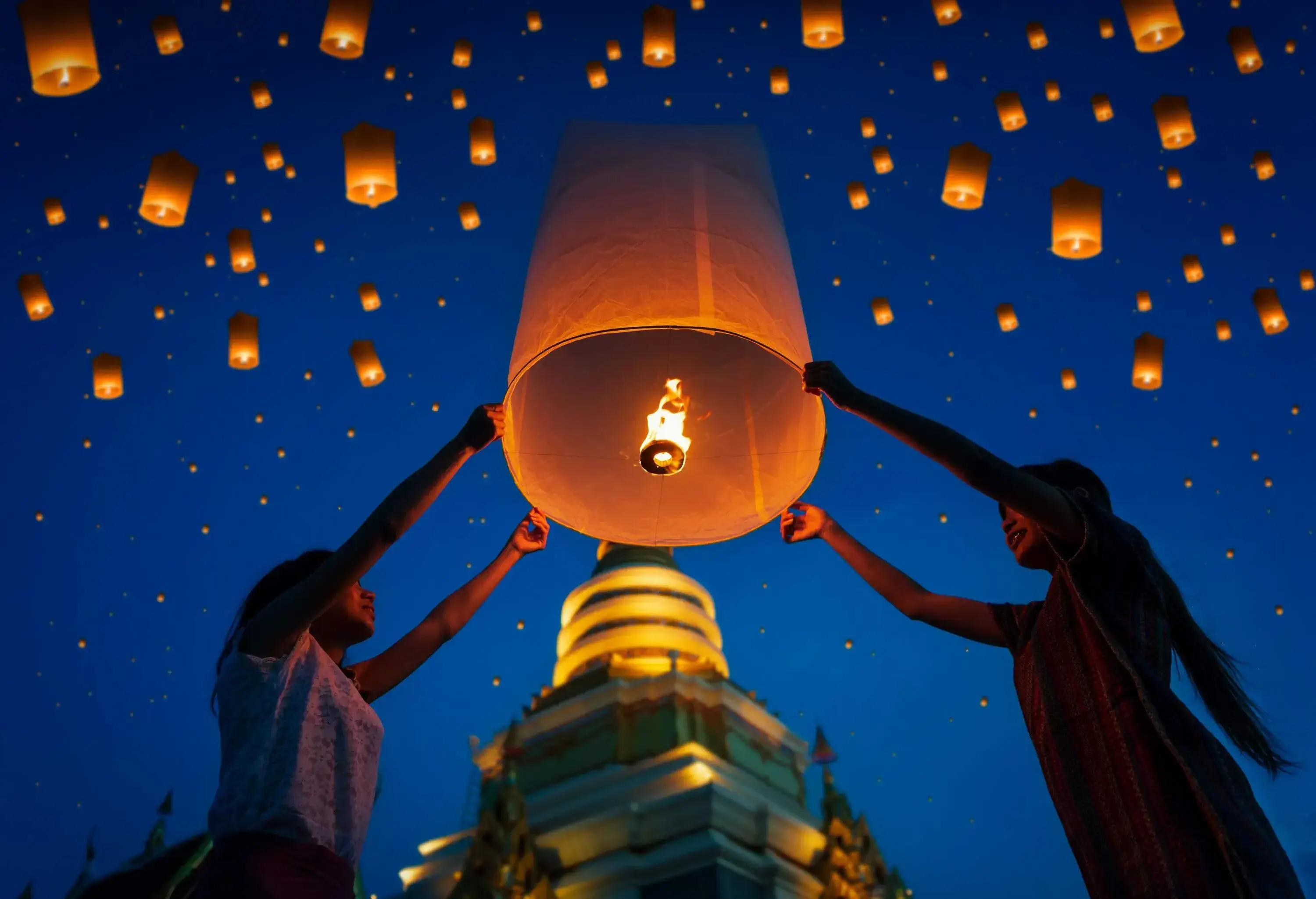 People floating lamp in Yi Peng festival at Chiangmai Thailand