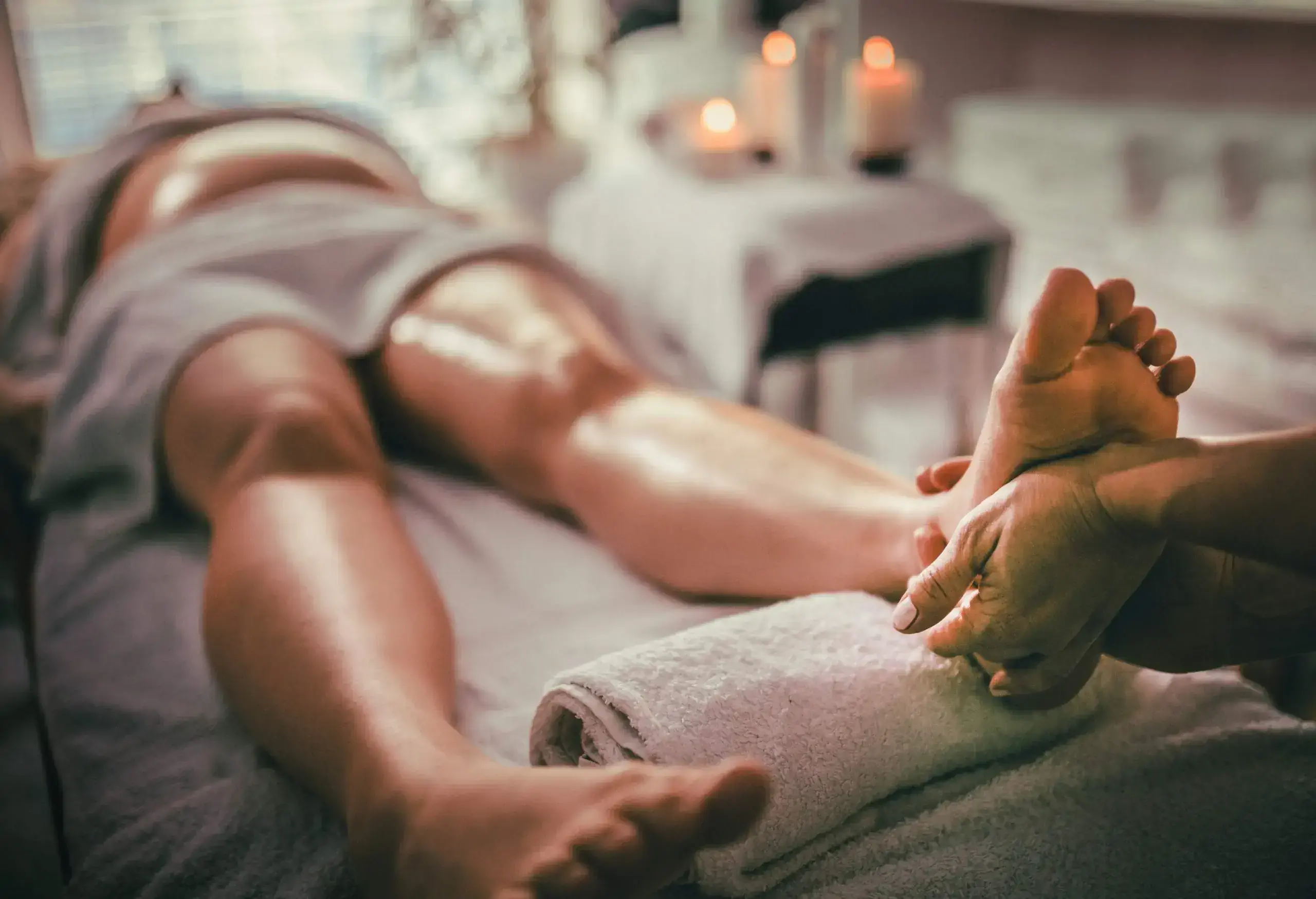 Pregnant woman having massage in spa relax.
