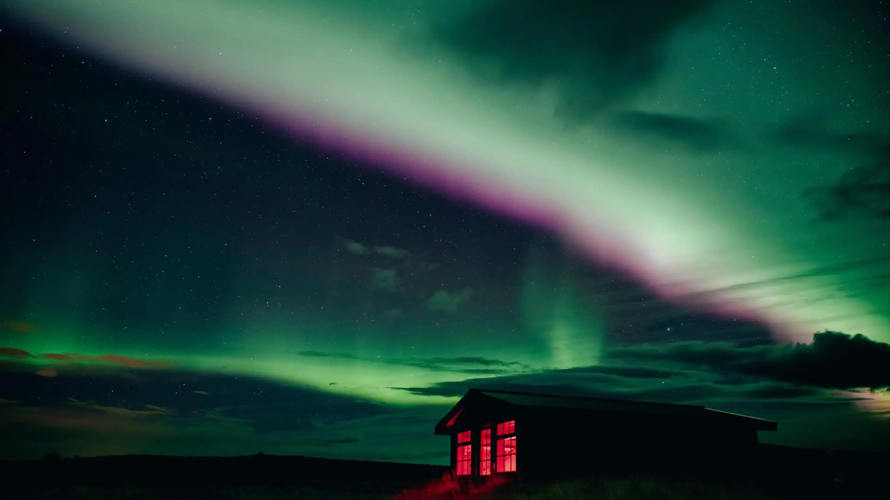 Aurora borealis or northern lights over romantic hotel