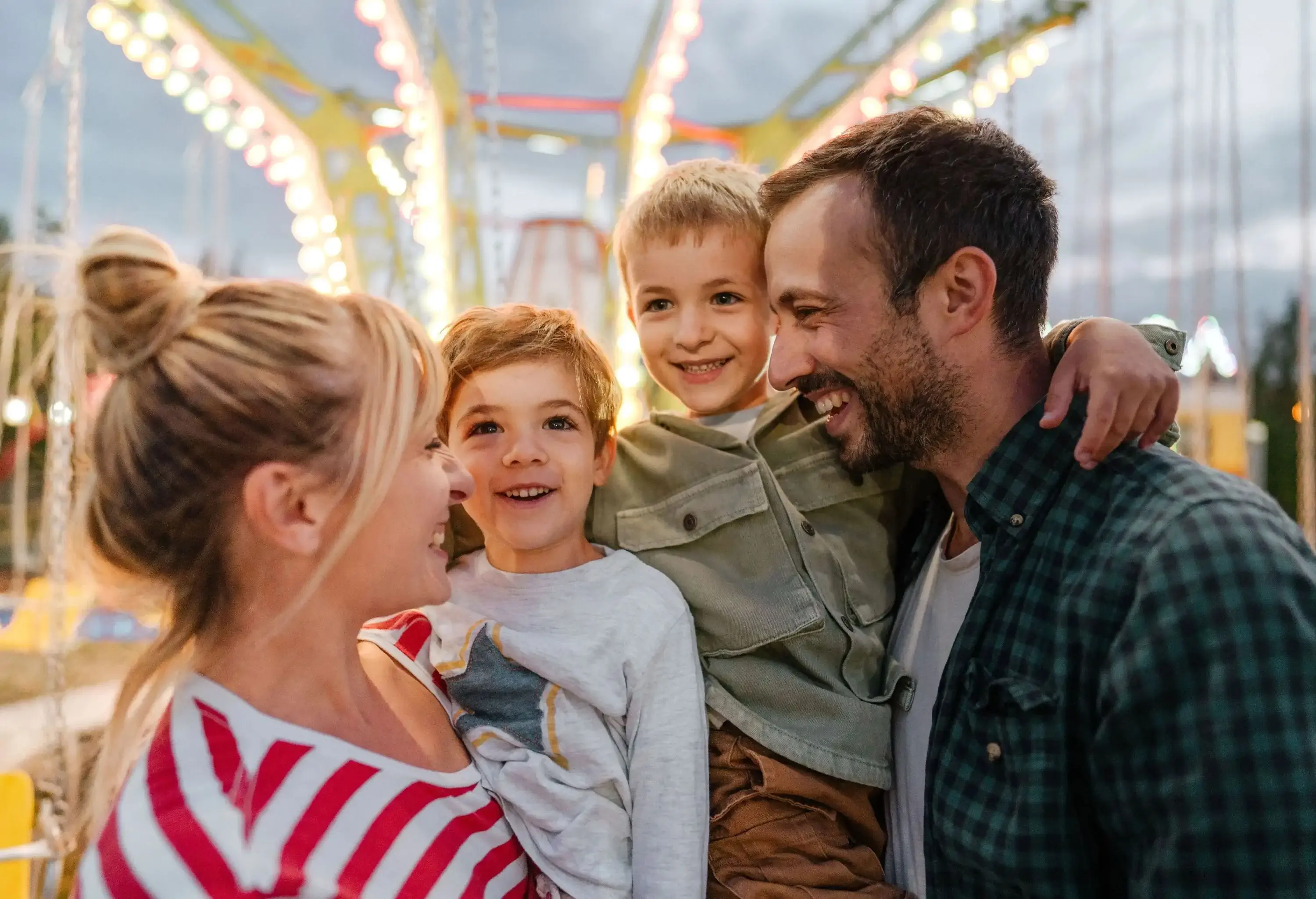 A happy couple and their two children enjoy some quality time together.