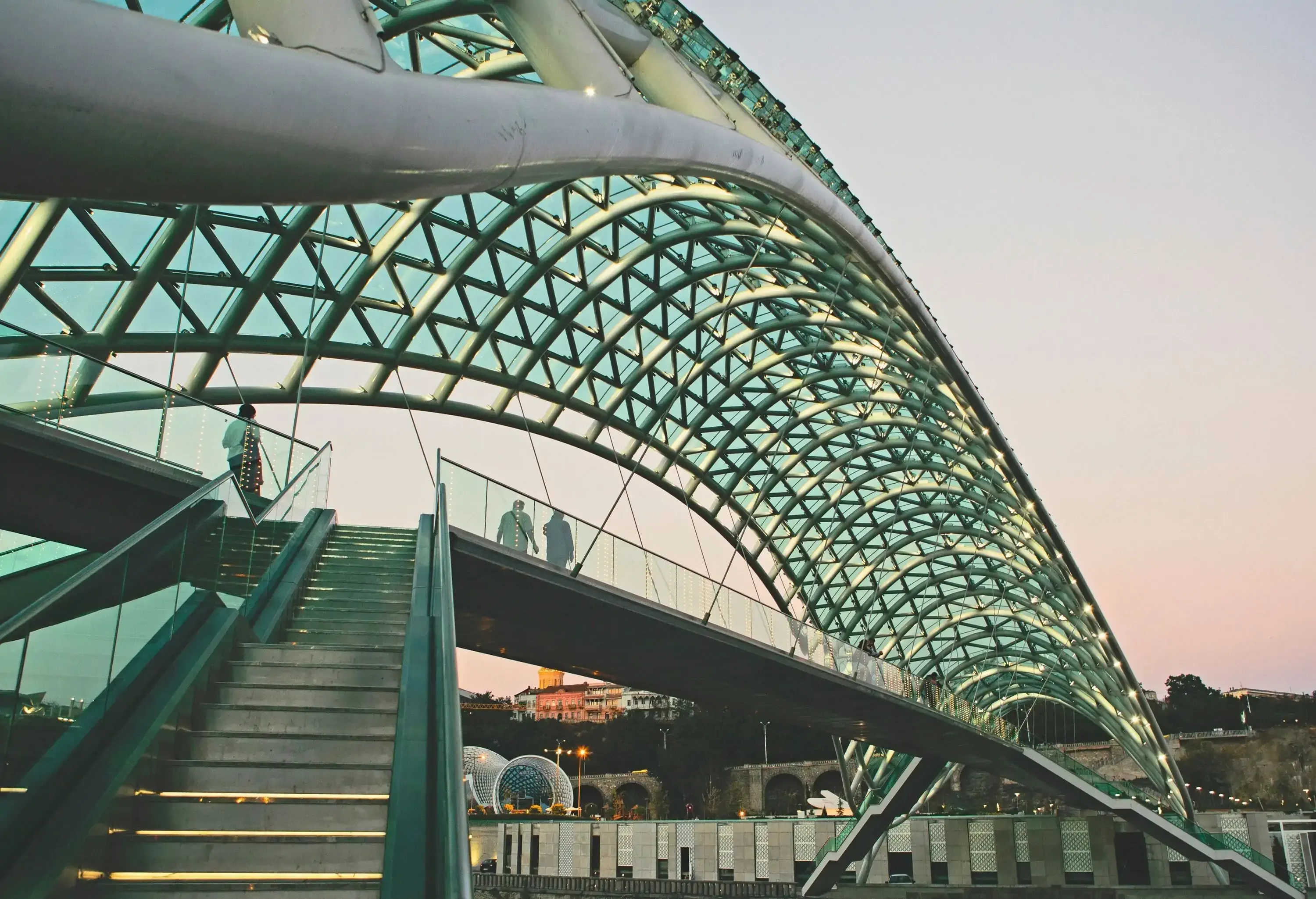 The Bridge of Peace is a bow-shaped pedestrian bridge over the Kura (Mtkvari) River in the capital of Georgia - Tbilisi.