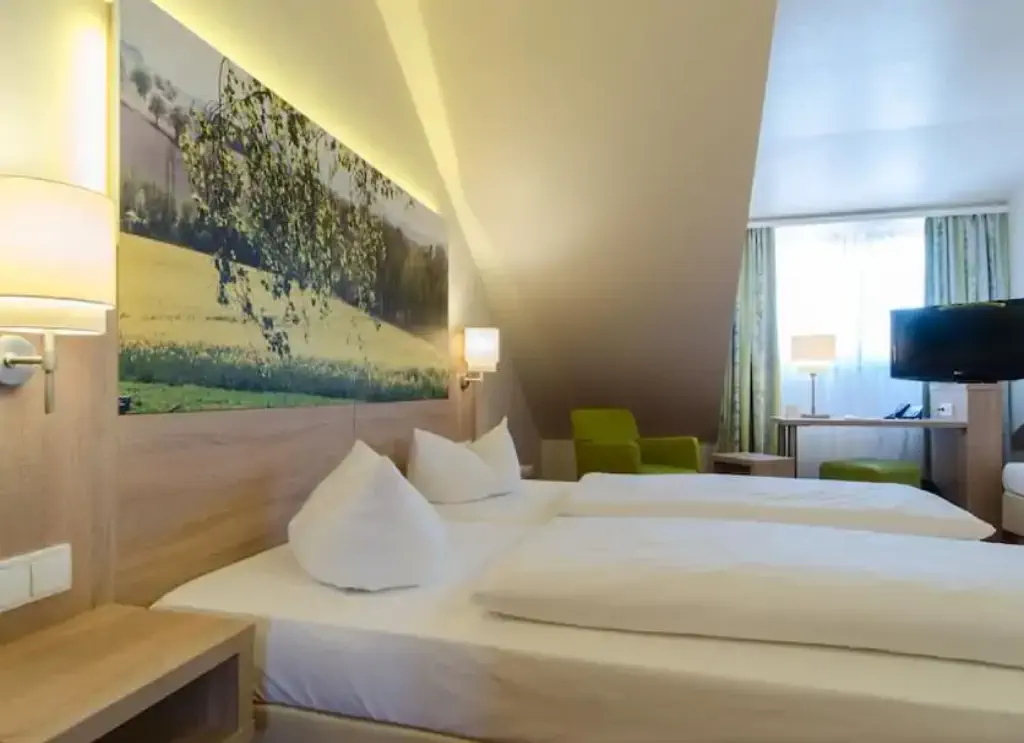 Garden Hotel provided by Expedia Group.