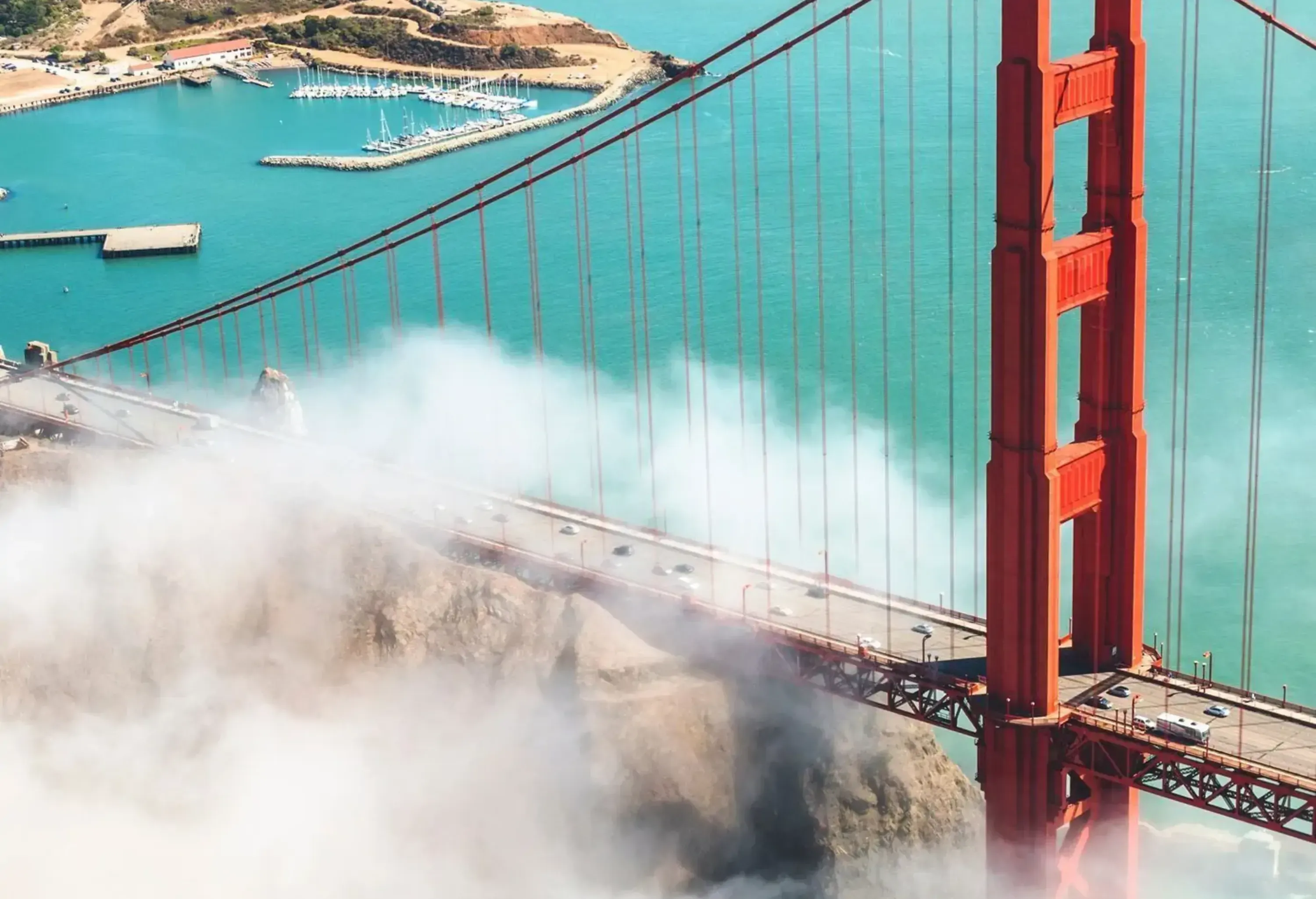 The iconic Golden Gate Bridge of San Francisco is beautifully shrouded in mist.